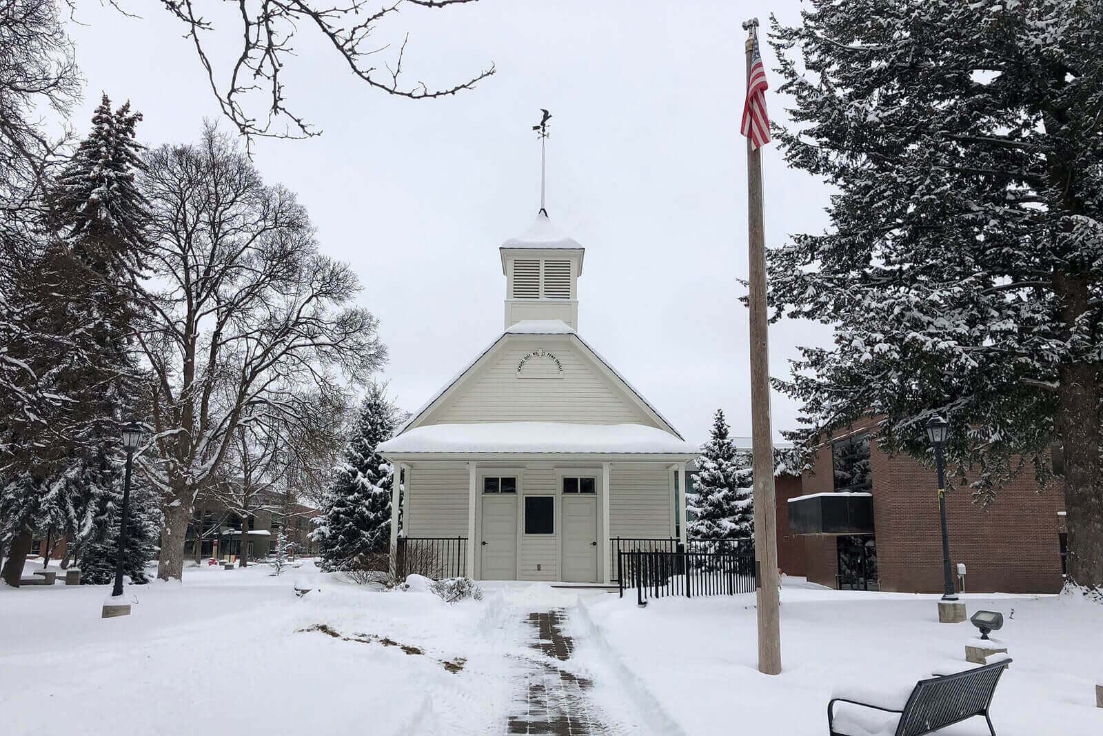 Snowy campus shot of the little school house