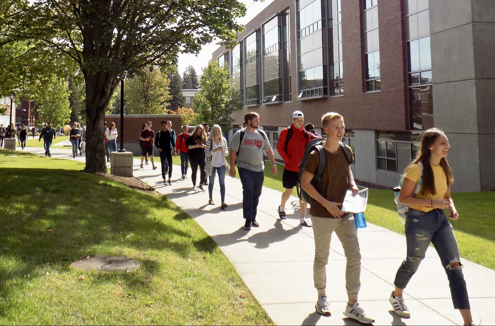 Students walk past Patterson Hall