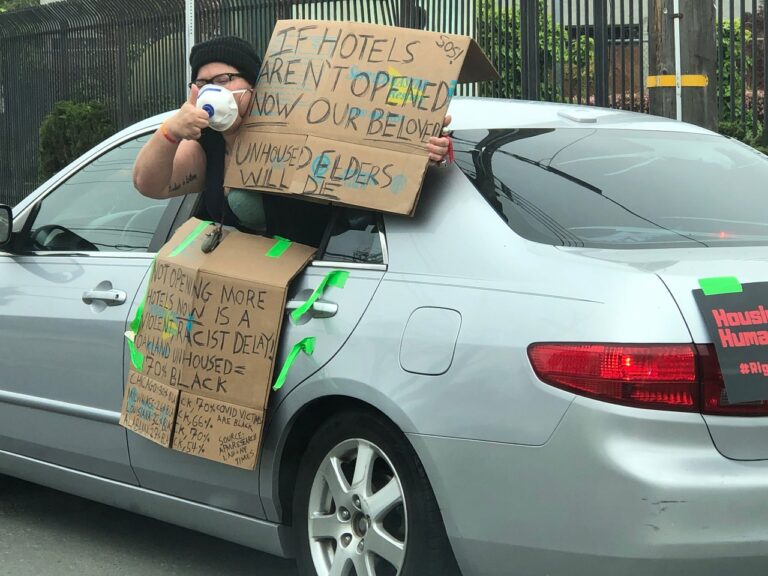 Image by Dr. Judy Rohrer: car protest that took place in Oakland, CA on April 11, 2020 organized by Mom’s 4 Housing and the Black Housing Union