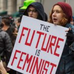 The future is feminist sign held by protestor