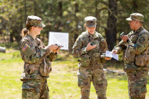 Military science students perform drills in the field