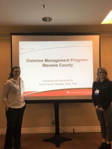 Two presenters with their slideshow about diabetes