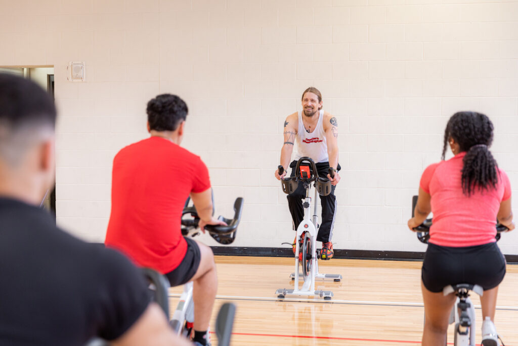 An EWU student leads an exercise class at the gym