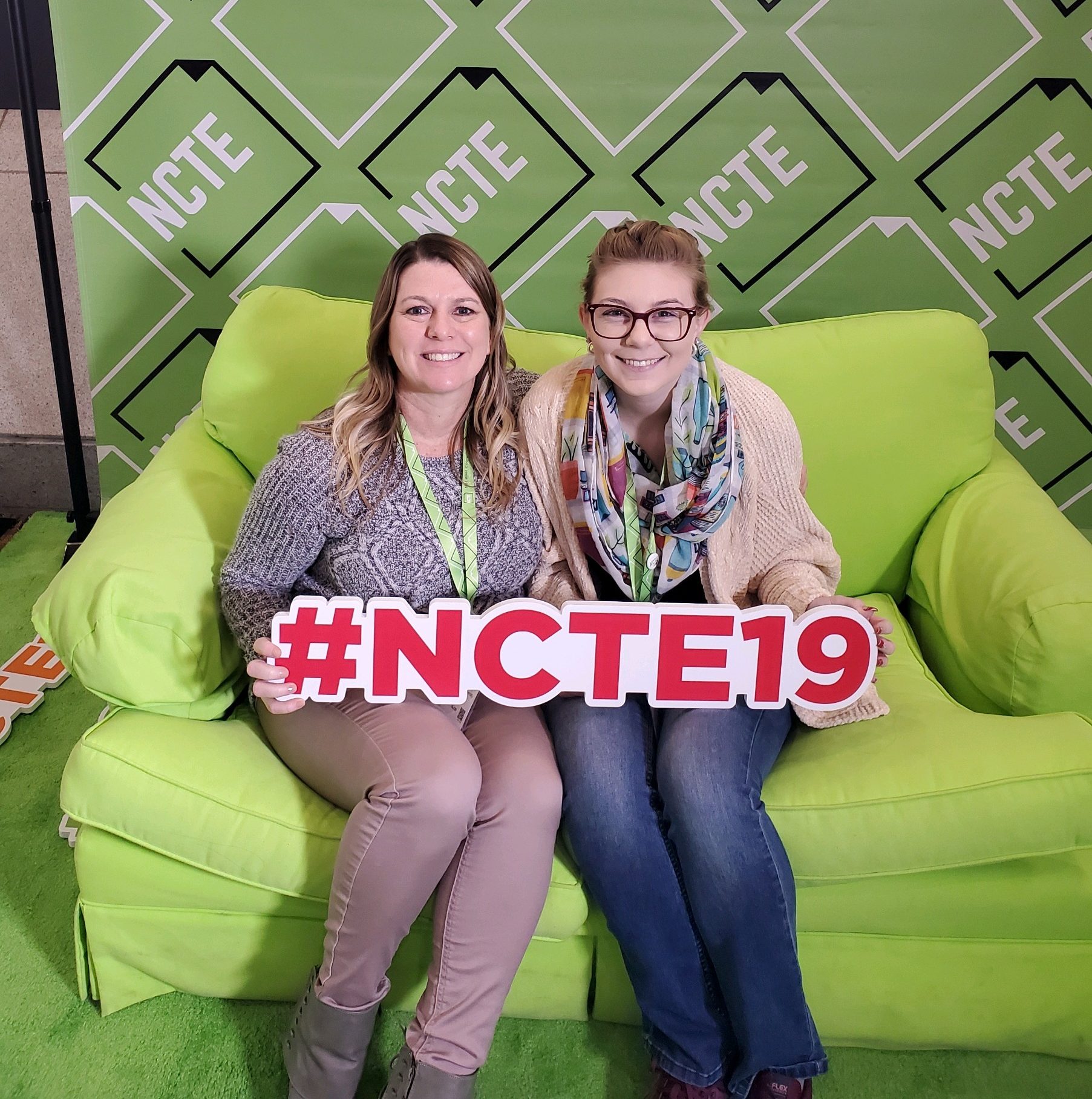 EWU students pose in the #NCTE19 photo booth