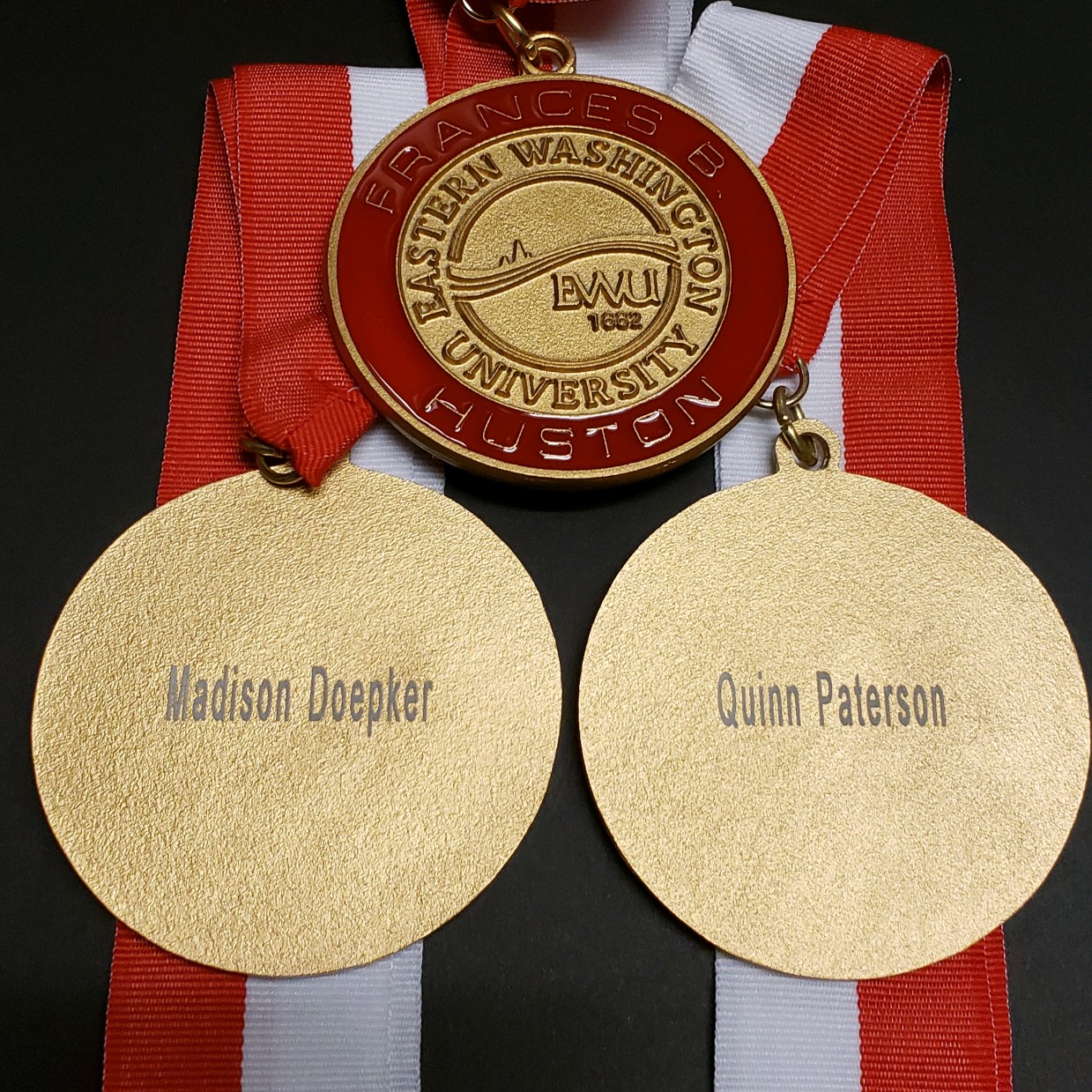 Frances B. Huston medallions engraved with the names Madison Doepker and Quinn Paterson