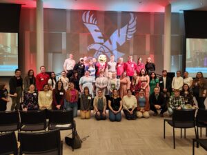 Group of students in front of the stage