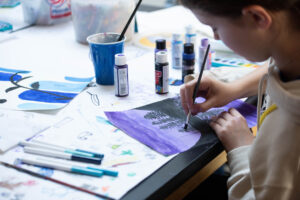 A child painting in class