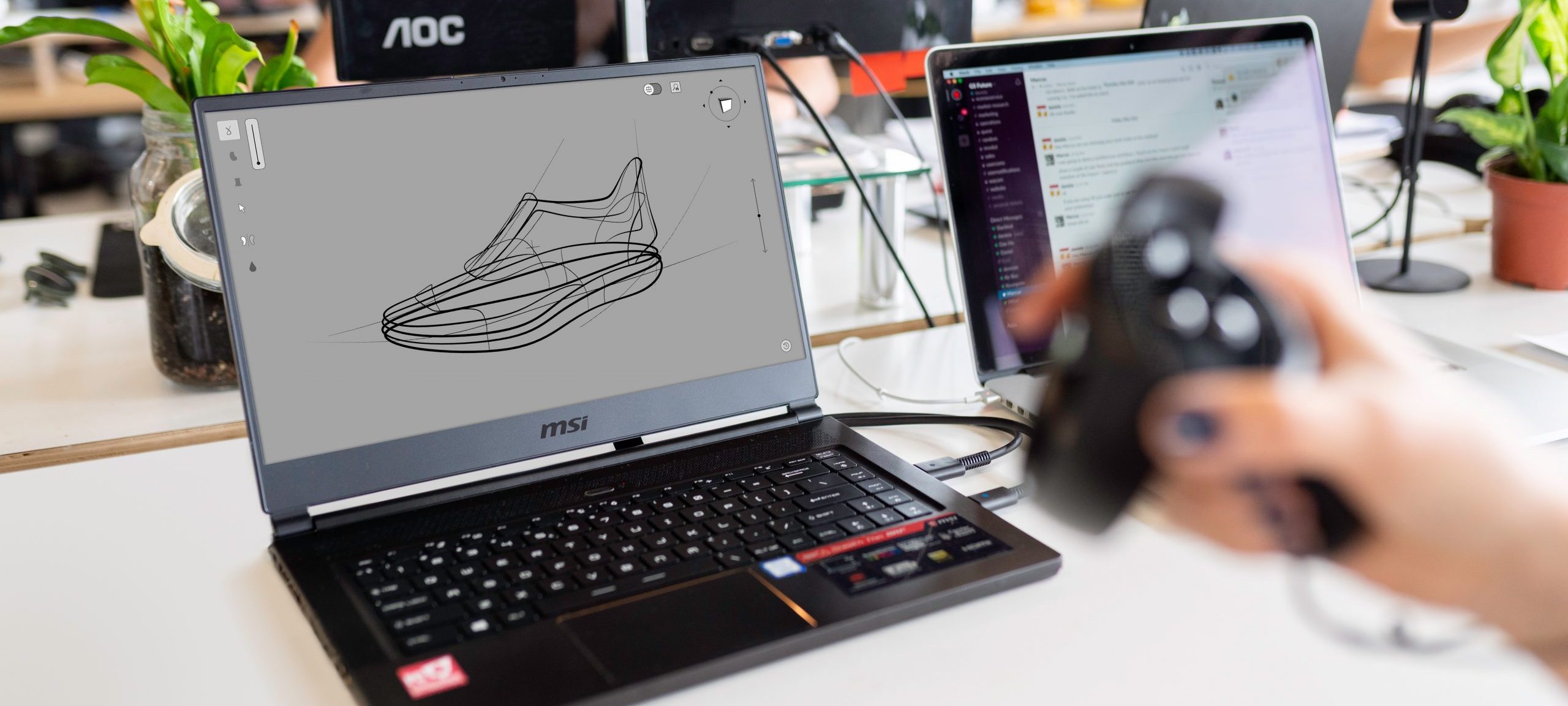 using a special controller to examine a 3d model of a shoe