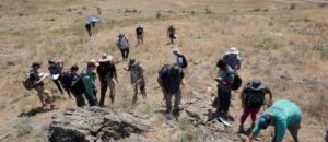 Geoscience students out on the saltese area studying rock formations