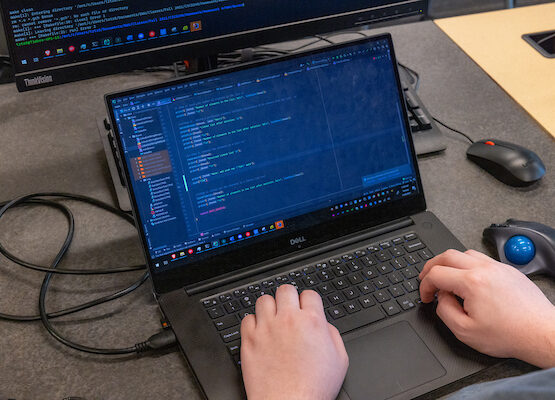 An EWU computer science student works on an assignment in class.