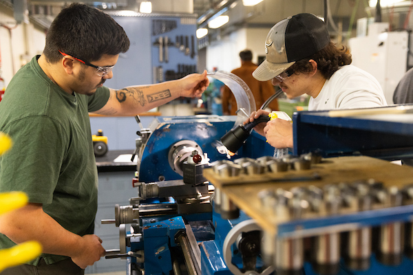 Two students collaborate on a project in the Engineering Foundry