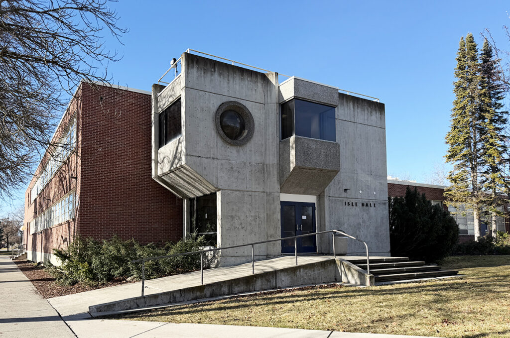 Exterior view of Isle Hall's main entrance with accessibility ramp