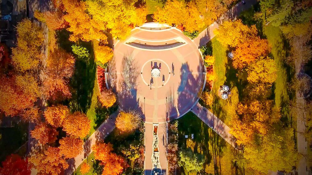 Aerial view of the campus mall with fall foliage