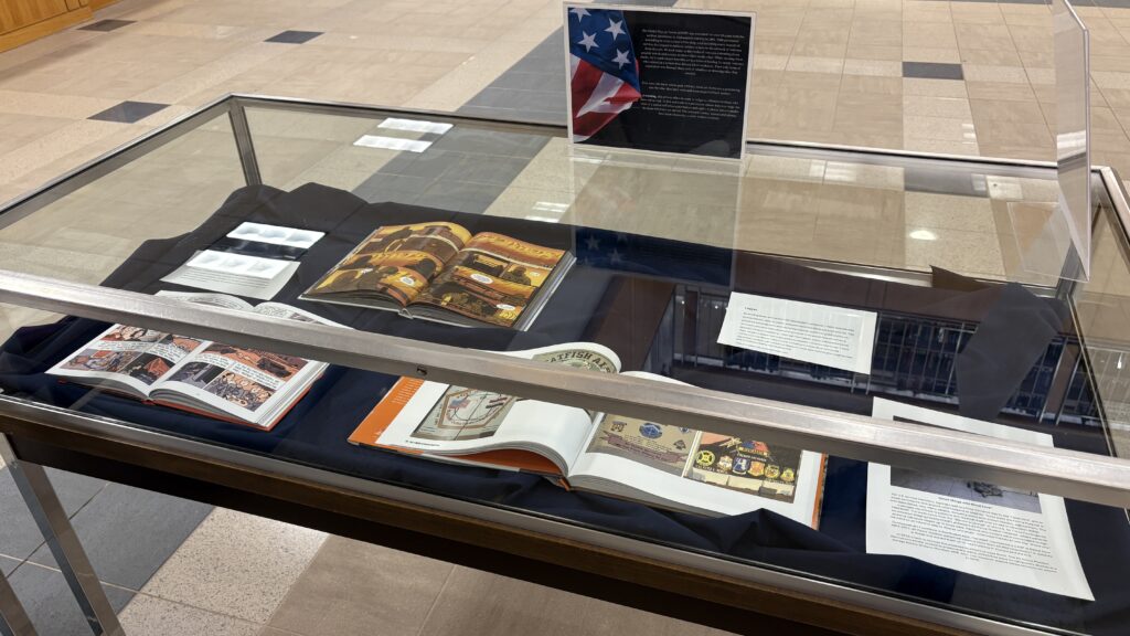 Photo of a display case of graphic novels from the Global War on Terror era