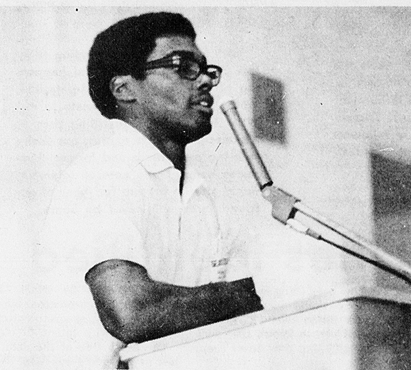 African American student talking in the microphone