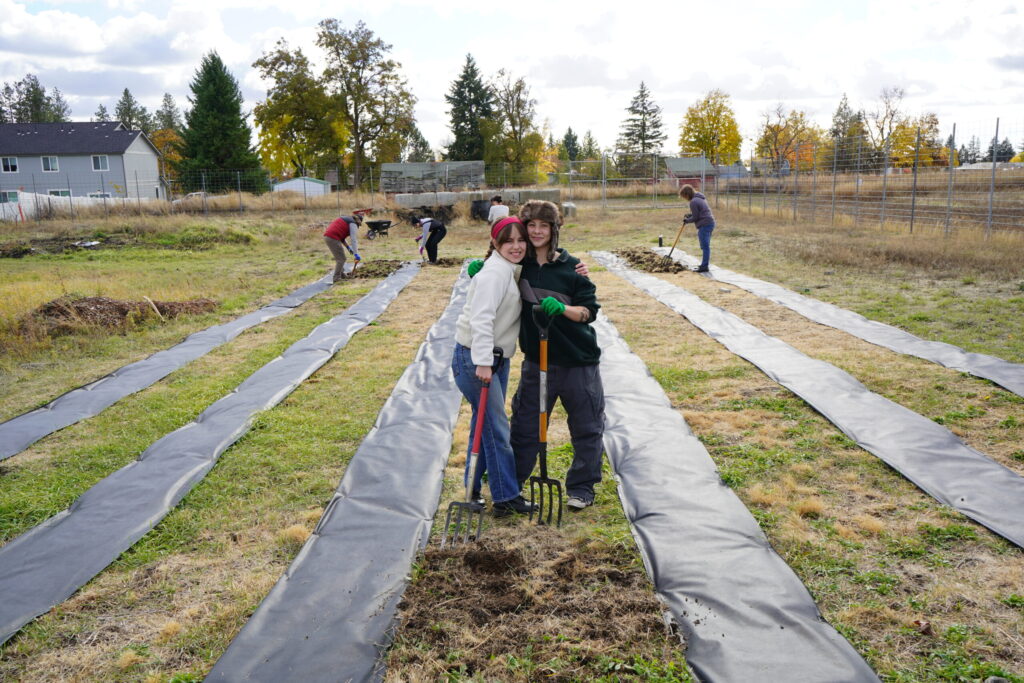 EWU students volunteer at the EWU Community Garden.
