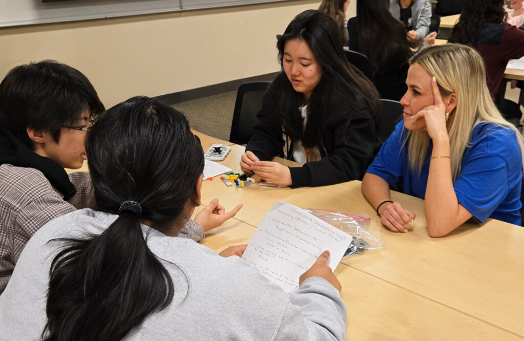English tutor working with Japanese students.