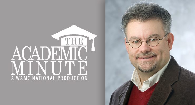 Smiling man with title "The Academic Minute: A WAMC National Production"