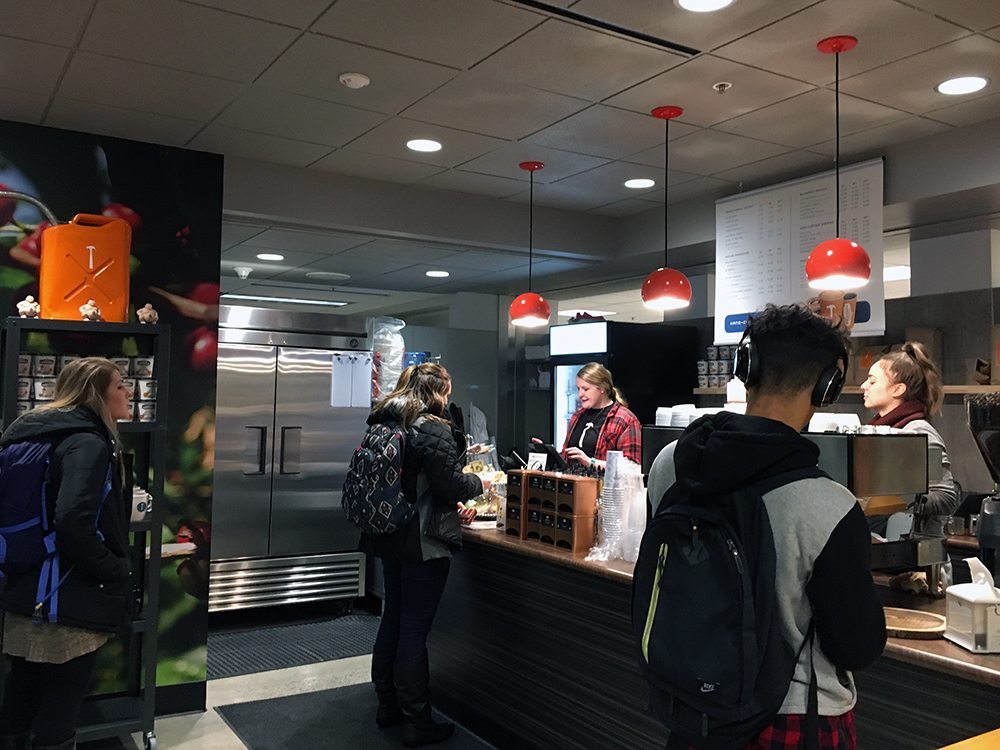Students ordering coffee at Thomas Hammer on campus