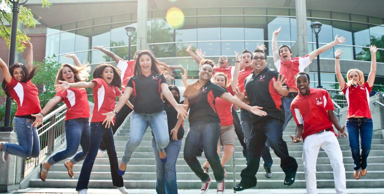 EWU Students celebrating in front of JFK Library