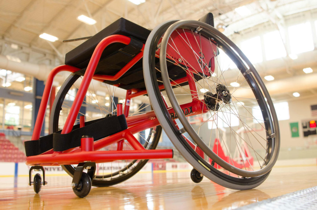 Red wheelchair for a basketball player