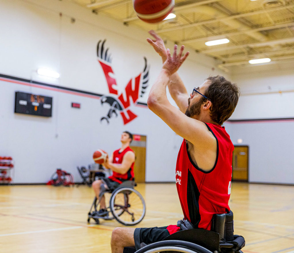 Wheelchair basketball player shooting a basketball