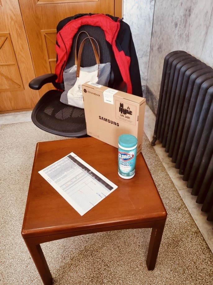box containing a laptop on a table