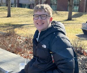 Sam Steege is pictured outside on the university campus.