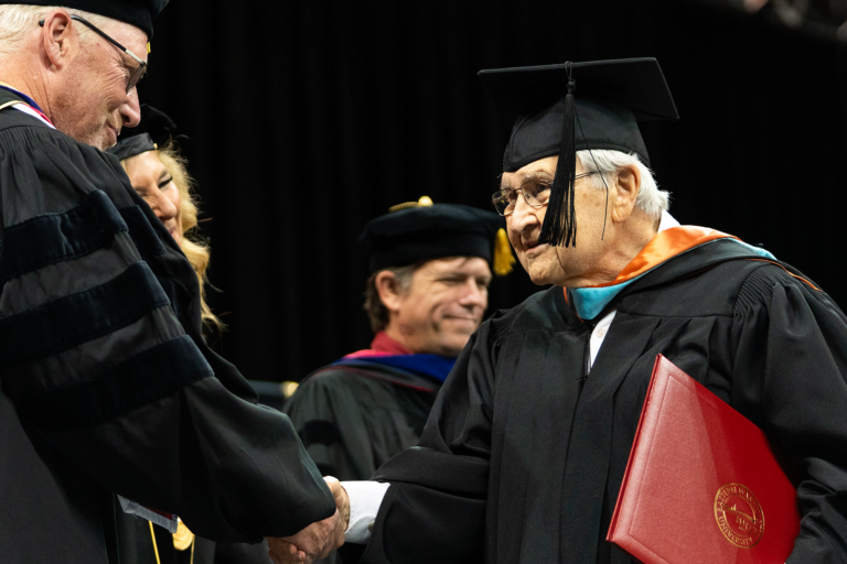 Photo of Larry Davis receiving his emeritus professorship.