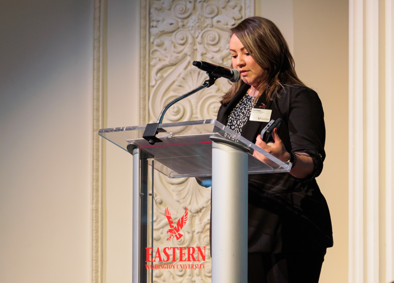 Cola Boyer delivering the land acknowledgement at a recent event.