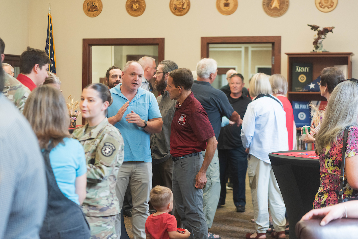 Dave talking to people.