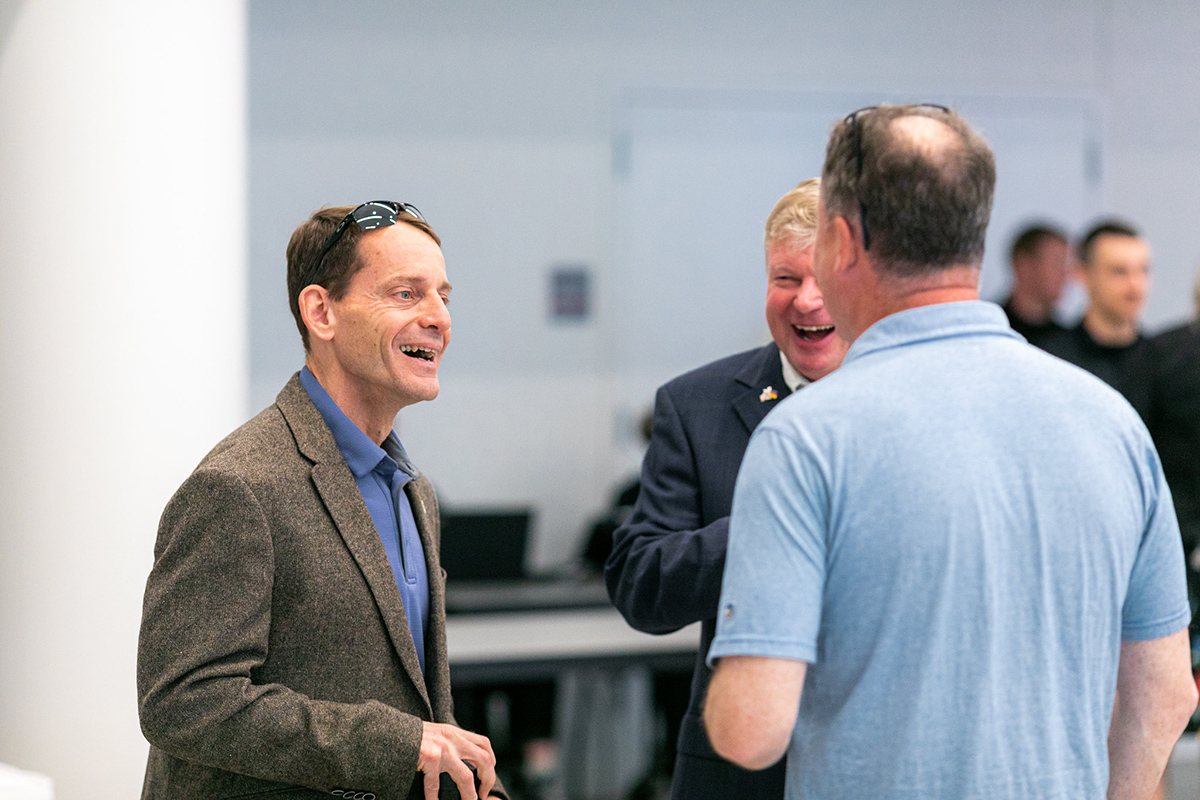 Dave Millet connecting with other staff.