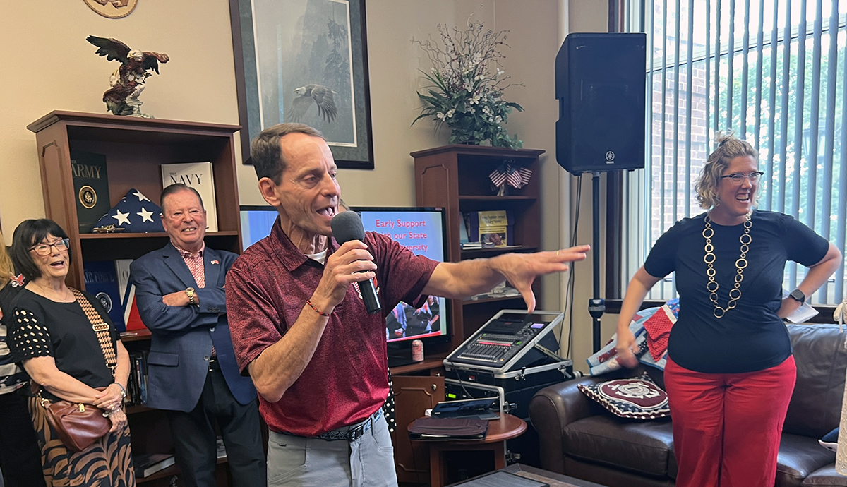 Dave Millet with the microphone.