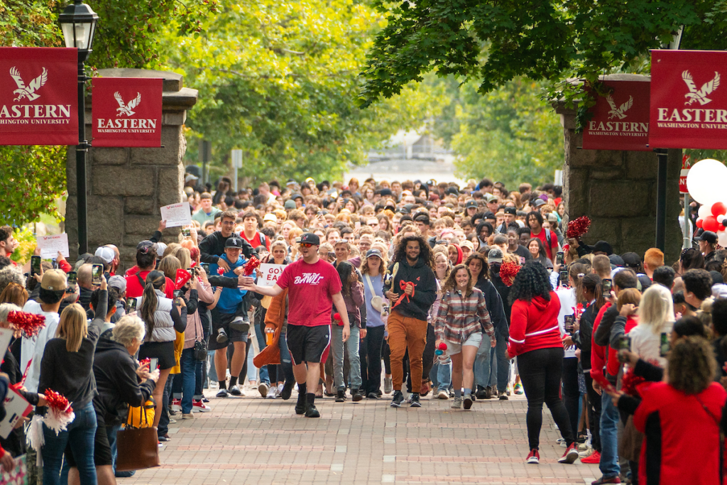 Pass through the pillars with students getting high-fives.