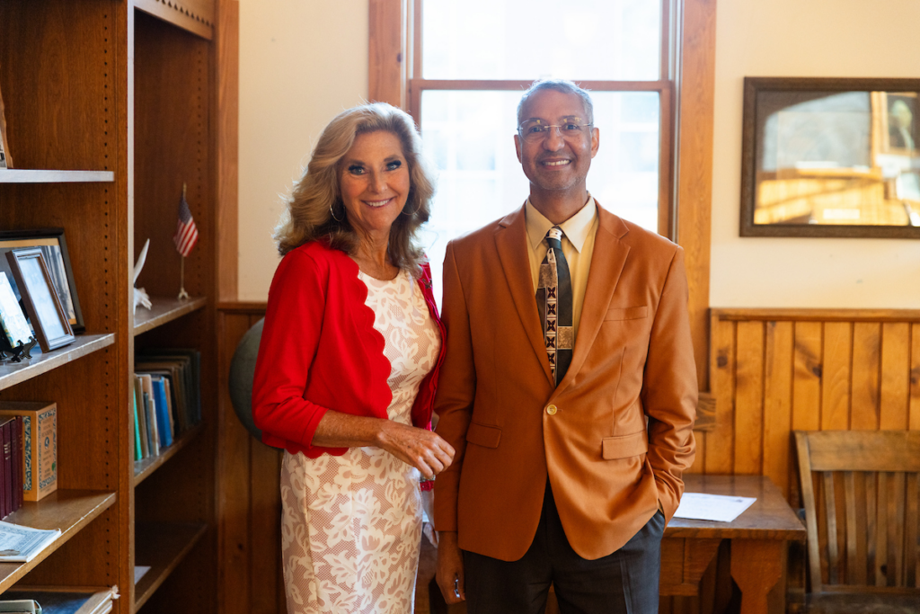 President McMahan and Provost Smith inside the schoolhouse.