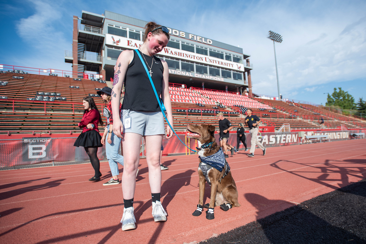 Student participates with her service dog.