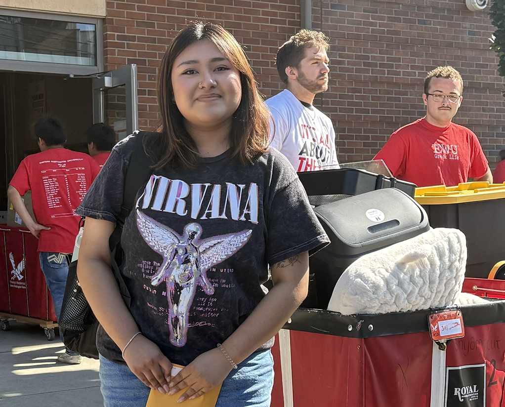 Student standing near doorway at snyamncut.