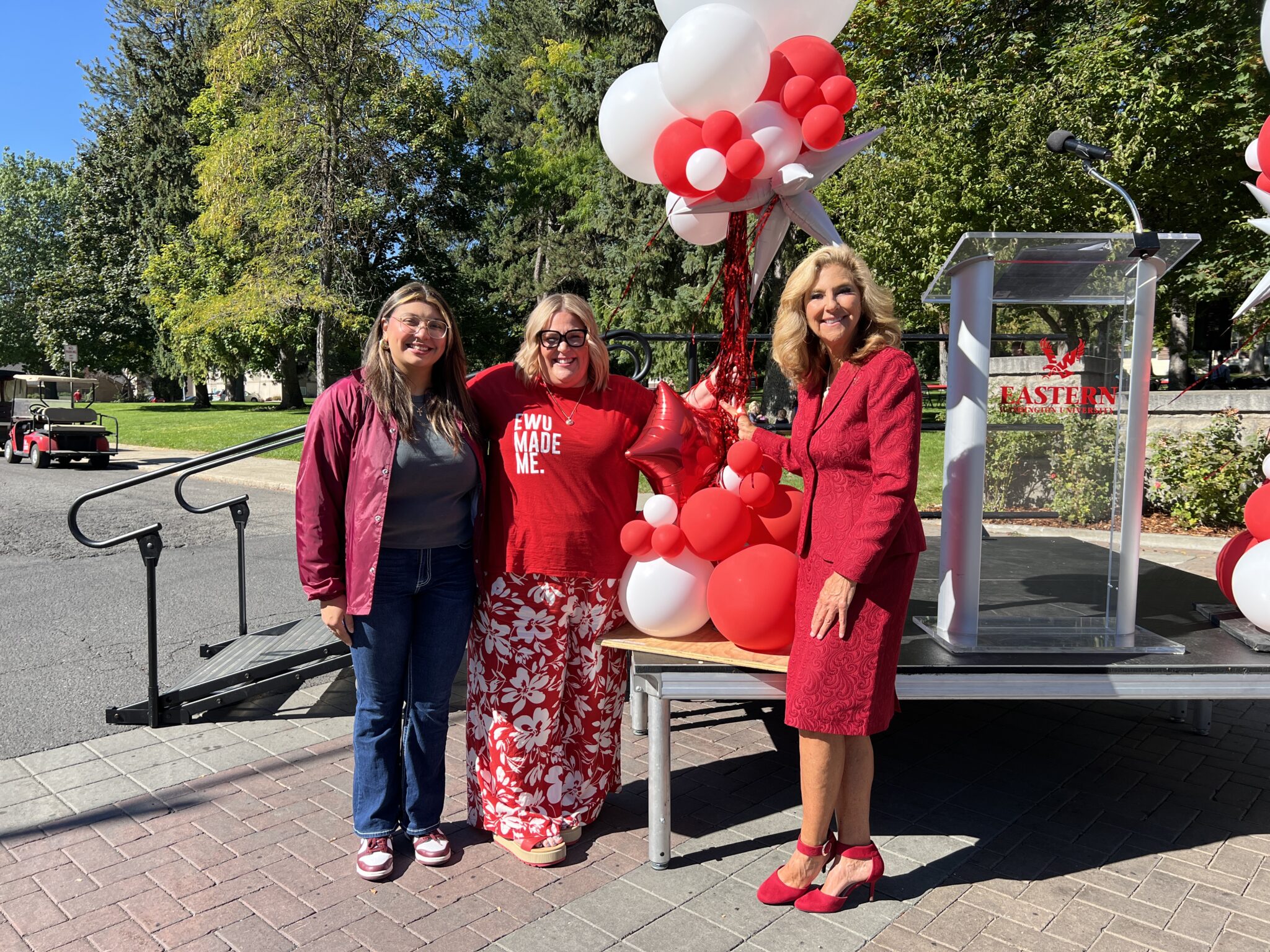 President McMahan with Kelsey Hatch-Brecek and the new president of the Associated Students of EWU.