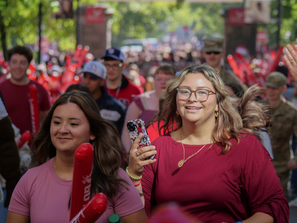 Students passing through the pillars.
