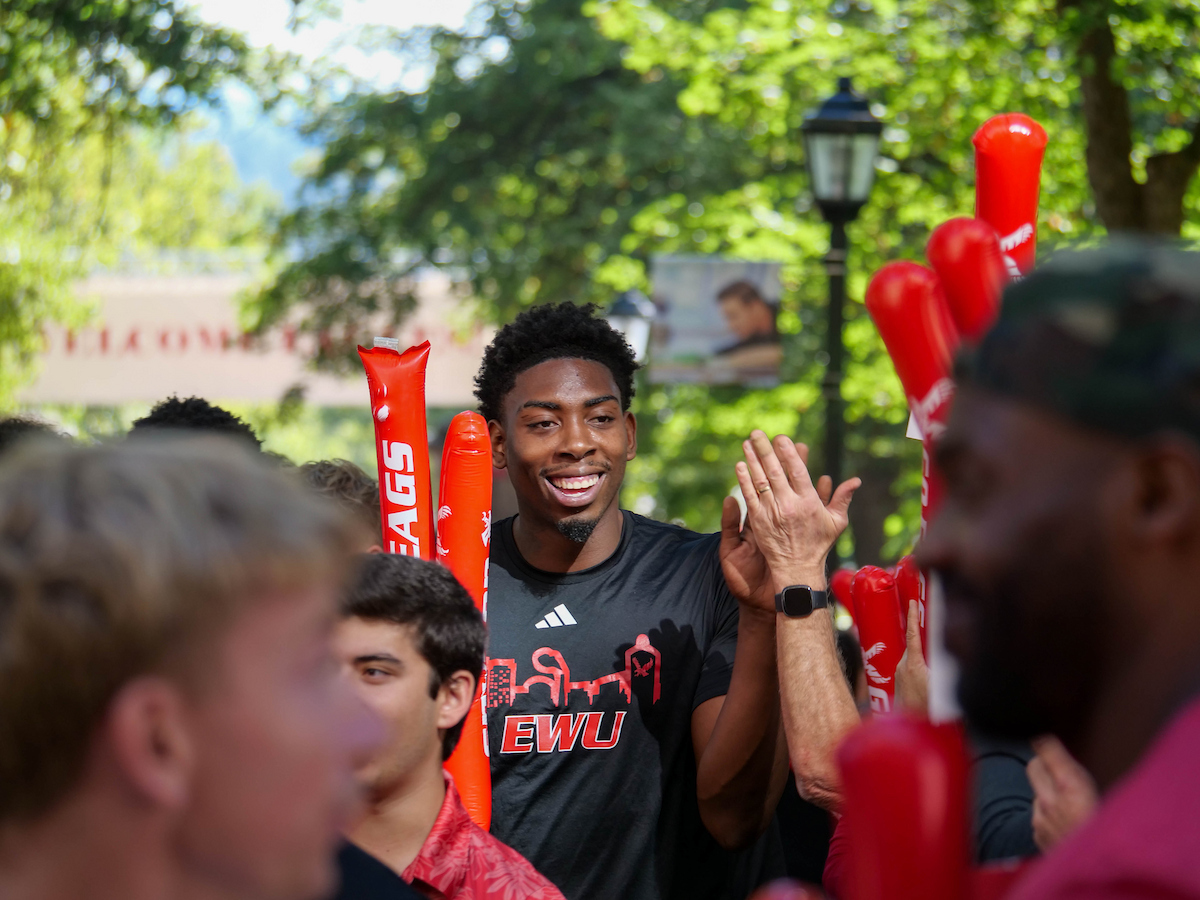 Incoming student getting a high-five.