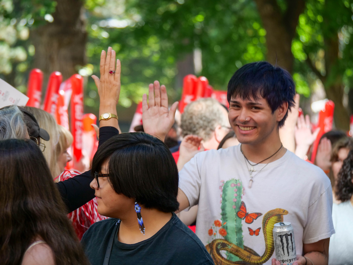 Incoming student waving.