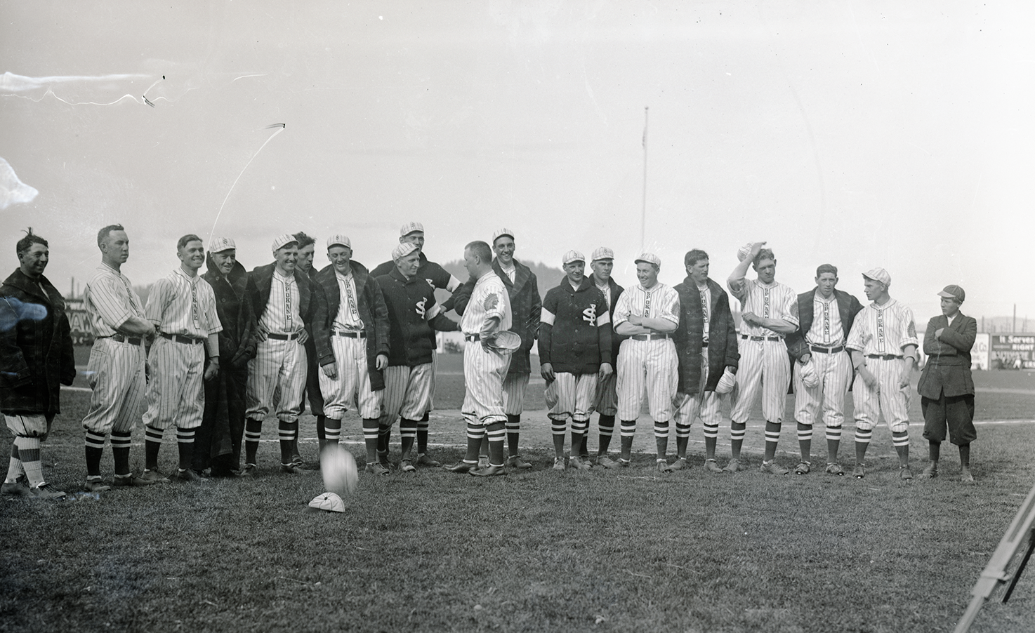 Historic photo of a team of Spokane Indians baseball players.