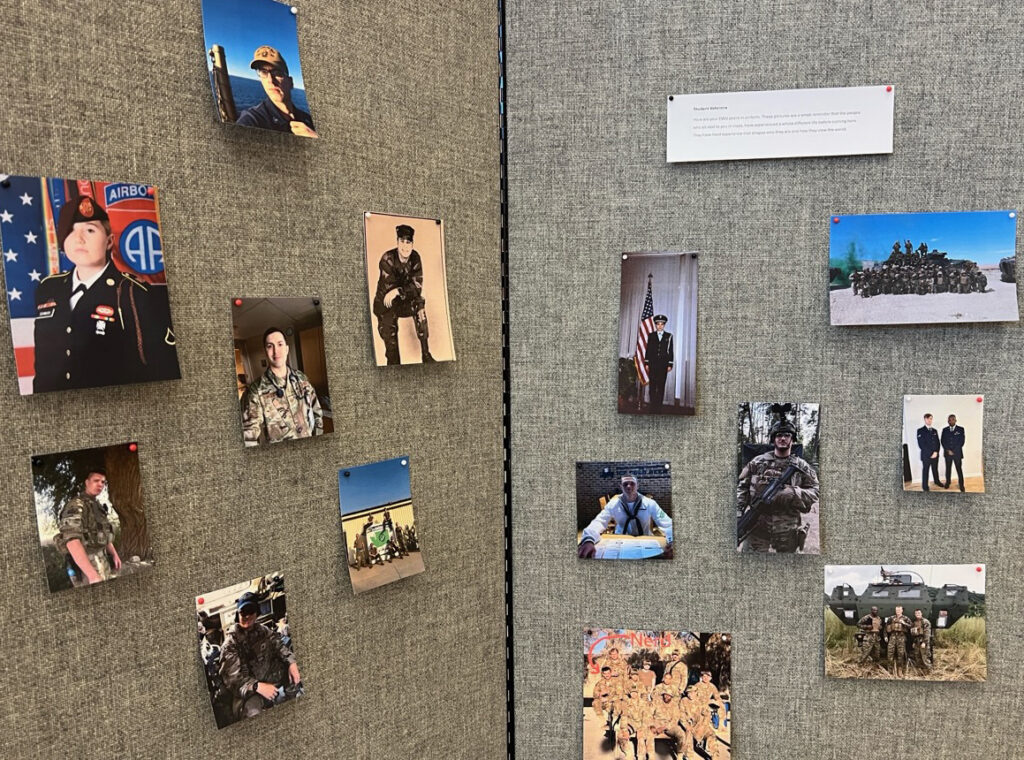 Display board with photos of EWU veterans.