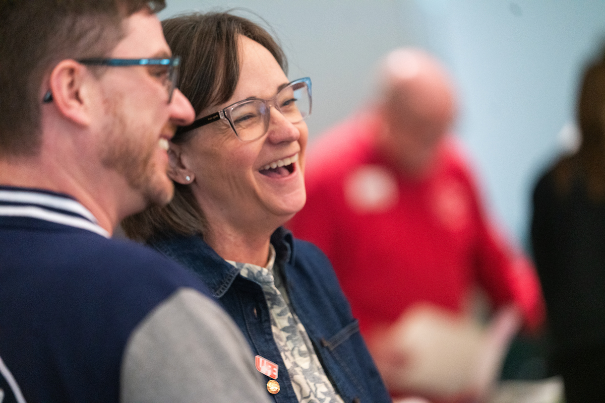 Lea Jarnagin with another employee laughing.