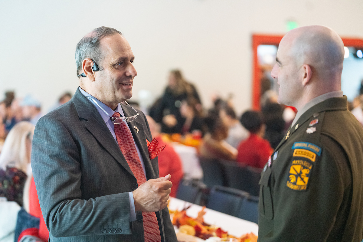 Two employees talking.