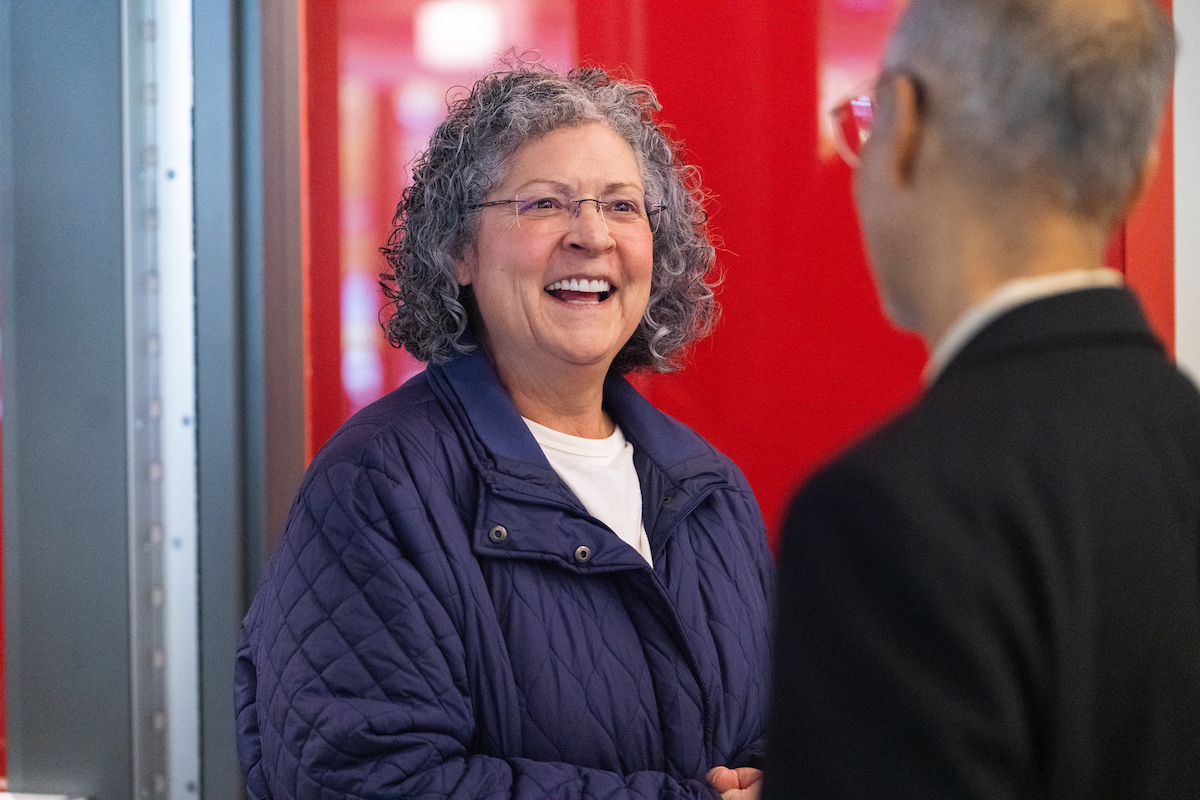 Employee talking to someone and laughing