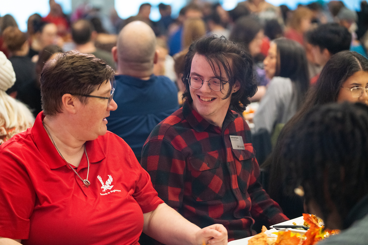 Two employees laughing