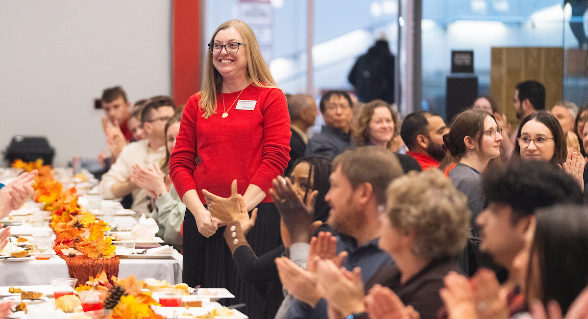 Amanda Reedy, interim dean of CPP, stands for a years of service applause