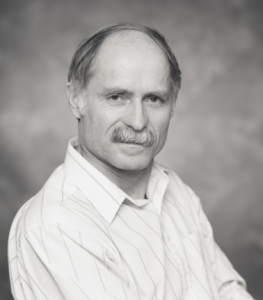 Black and white photo of John Mager.