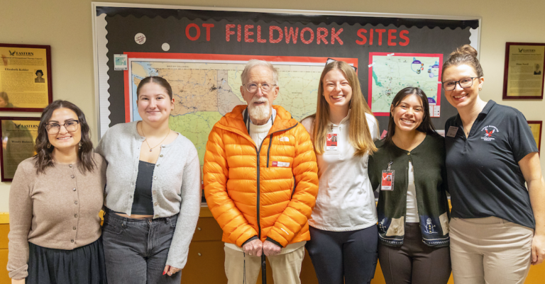 Bill Youngs with five occupational therapy students.